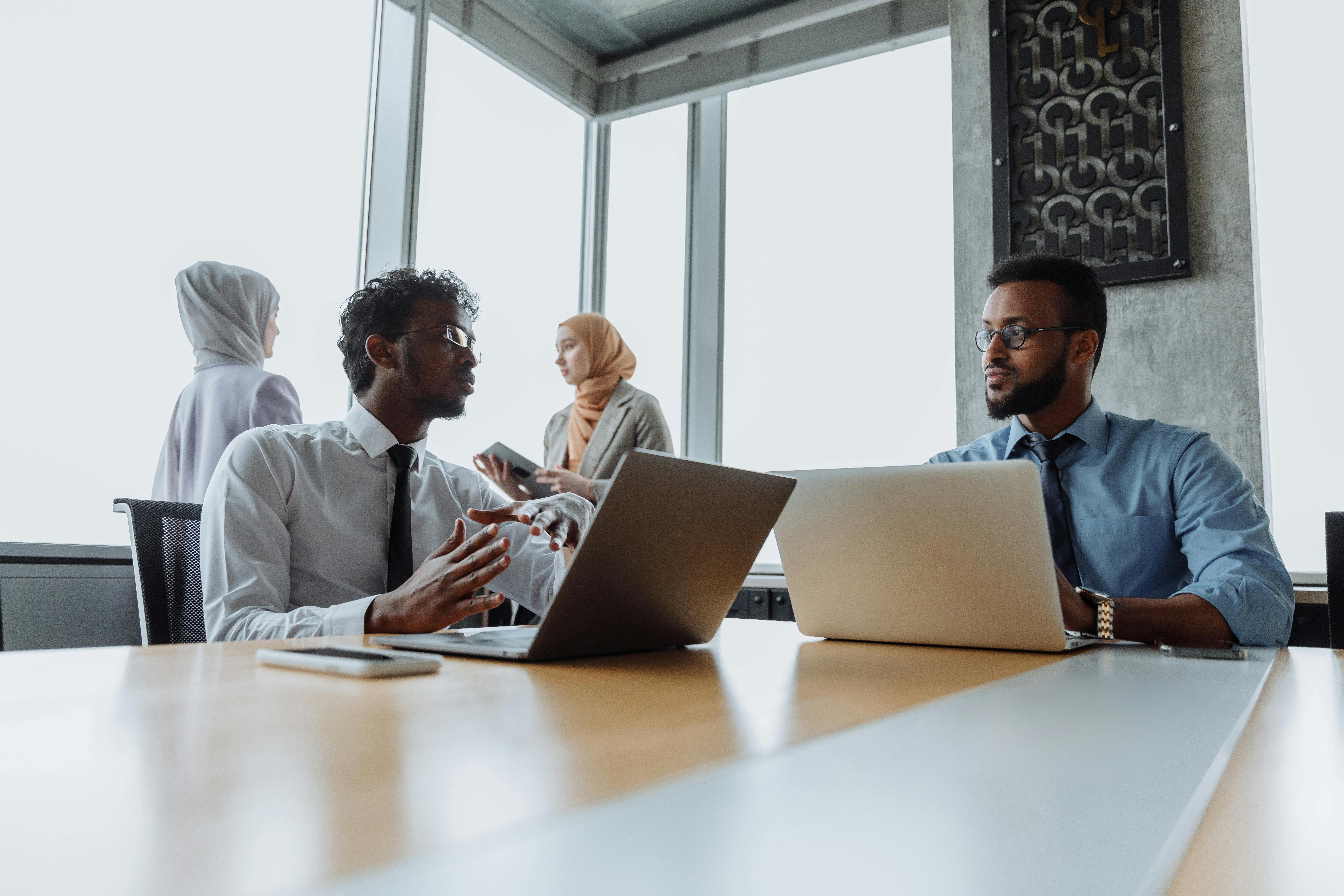 Professionals collaborating in a modern business meeting